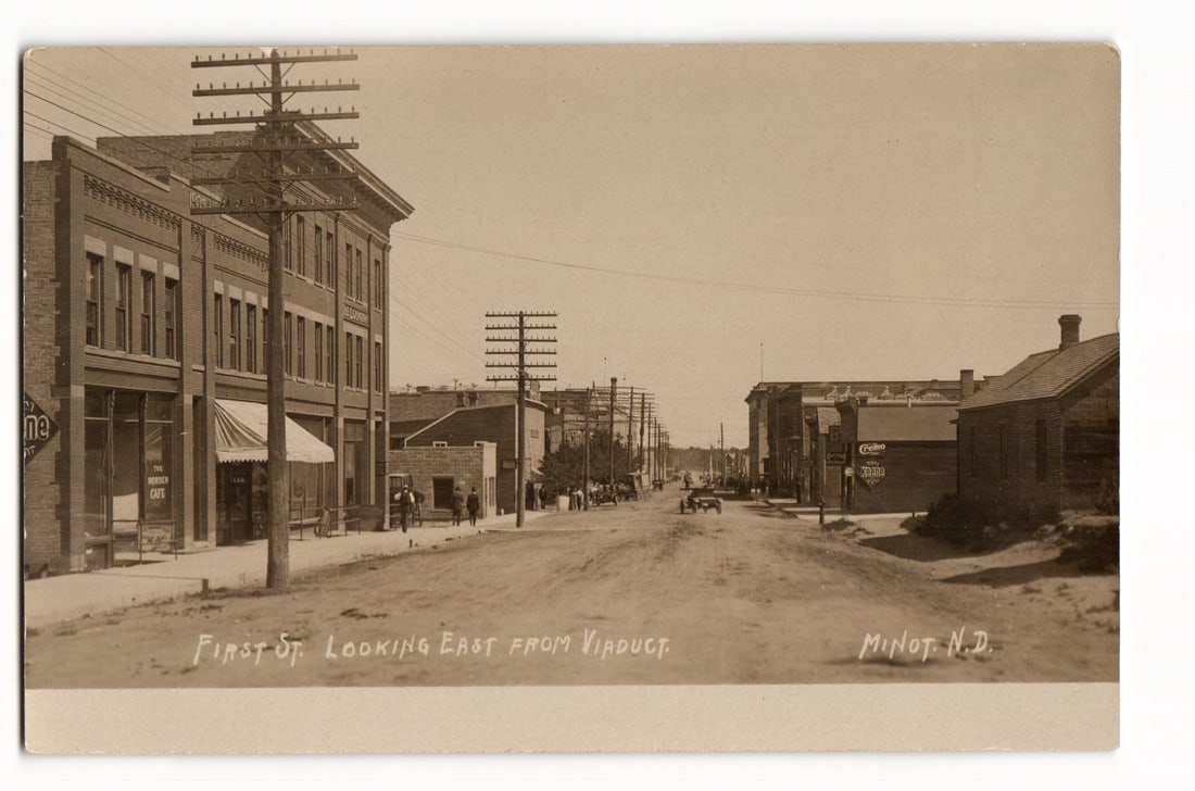 First St. from Viaduct, Minot, N.D., Early 20th C. Street Scene with Automobiles Postcard (1 of 2)