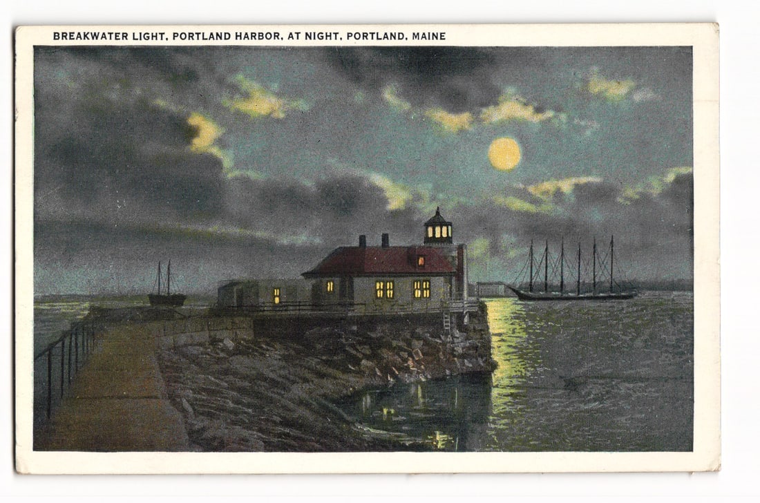 Breakwater Light, Portland Harbor, At Night, Portland, Maine. Nocturnal Lighthouse Postcard: A colorized depiction shows the Breakwater Light in Portland Harbor, Maine, at night. The lighthouse structure, situated on a rocky outcrop, is illuminated from within, with light emanating from its w