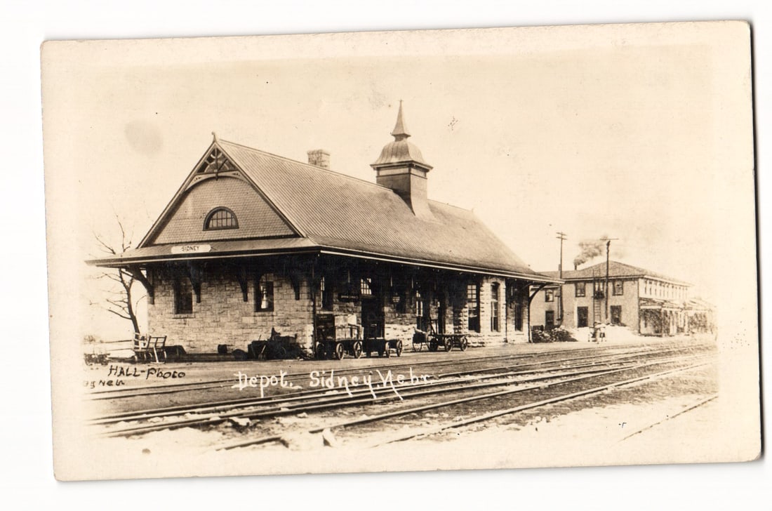 RPPC Sidney, Nebraska, Stone Railroad Depot w/ Cupola, Tracks, Carts, Hall Photo, c. 1904-1918: Please view photos for further description and condition considerations. Please know the scans may be darker or lighter than the actual card's true appearance. FREE SHIPPING POLICY: (Domestic USA Only