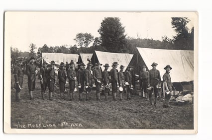 WWI-Era RPPC of "The Mess Line," 9th N.V.M. Regiment Soldiers at Military Tent Encampment.