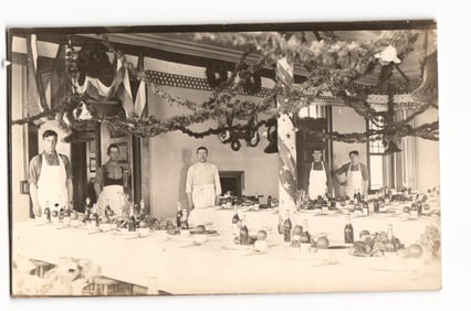 c. 1910s RPPC Fort Warren, Massachusetts Army Cooks in Mess Hall for a Festive Holiday Banquet
