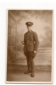 WWI British Army Soldier in Uniform with Swagger Stick, Full-Length Studio Portrait RPPC by Jerome