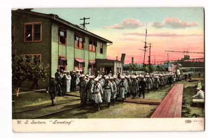 c.1910s U.S. Sailors "Landing" Color Postcard, Marching at Naval Base with Early Seaplane.