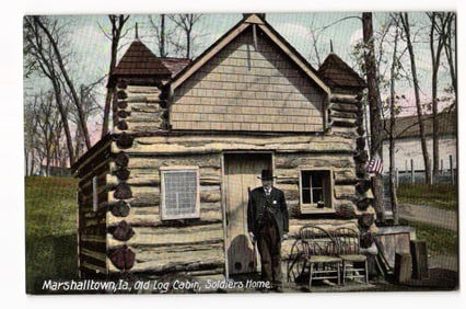 c. 1908 Postcard, Old Log Cabin at Iowa Soldiers' Home in Marshalltown, Man Poses with Badge