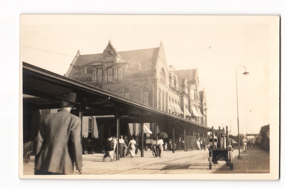 RPPC Real Photo Postcard view of the Lincoln, Nebraska train depot with travelers on platform c.: Please view photos for further description and condition considerations. Please know the scans may be darker or lighter than the actual card's true appearance. ACME Auctions offers FREE DOMESTIC SHIPP