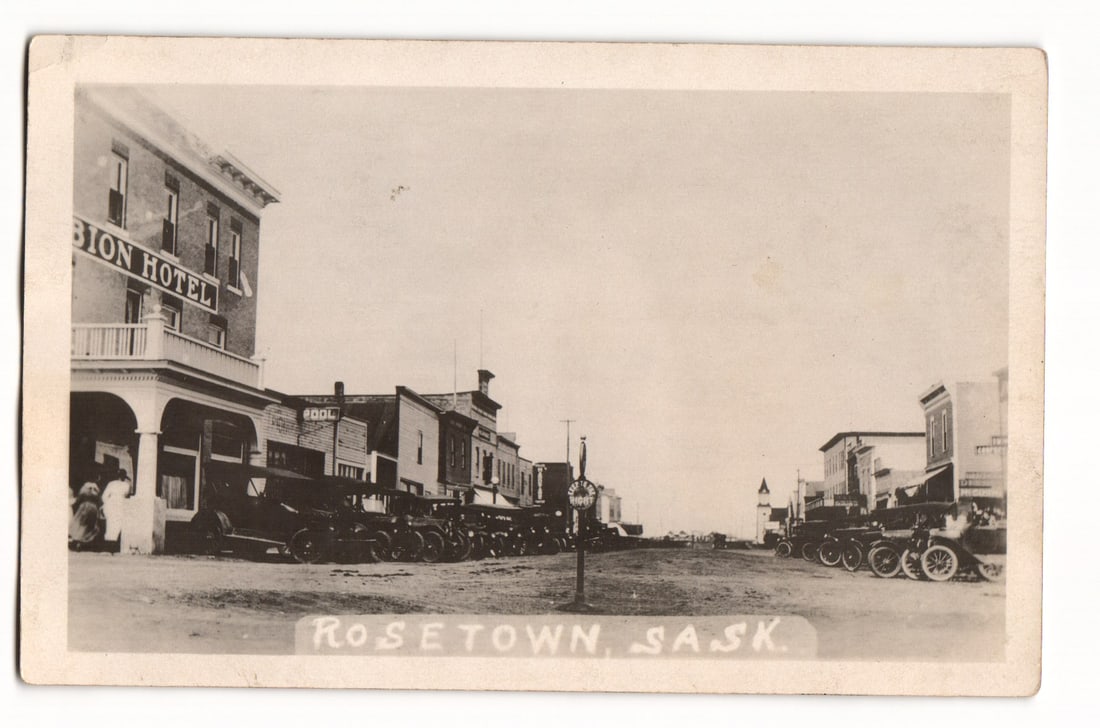 RPPC Real Photo Postcard street scene with early automobiles & Albion Hotel, Rosetown, Saskatchewan. (1 of 2)