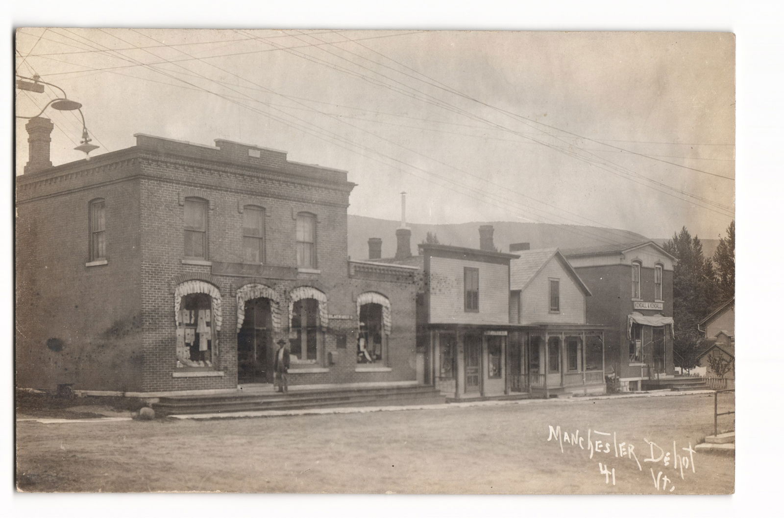 RPPC Real Photo Postcard showing street scene with storefronts in Manchester Depot, VT, circa 1910s.: Please view photos for further description and condition considerations. Please know the scans may be darker or lighter than the actual card's true appearance. ACME Auctions offers FREE DOMESTIC SHIPP