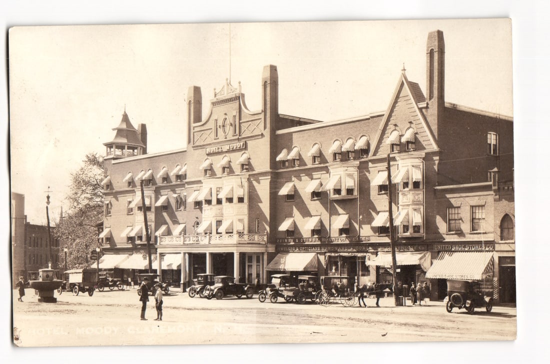 Hotel Moody RPPC Claremont New Hampshire Early Street View with Automobiles, Carriages and Stores: Please view photos for further description and condition considerations. Please know the scans may be darker or lighter than the actual card's true appearance. ACME Auctions offers FREE DOMESTIC SHIPP