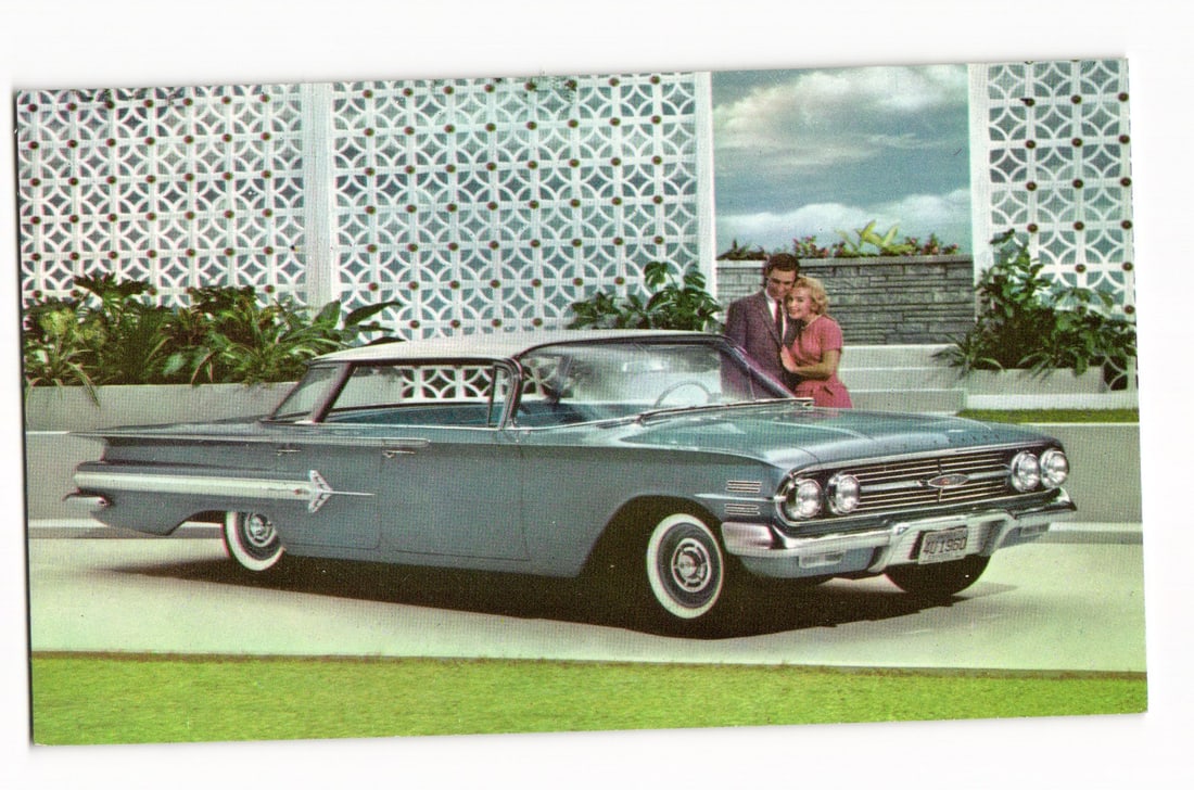 Advertising postcard for the 1960 Chevrolet Impala 4-Door Sport Sedan in a Mid-Century setting.: Please view photos for further description and condition considerations. Please know the scans may be darker or lighter than the actual card's true appearance. ACME Auctions offers FREE DOMESTIC SHIPP