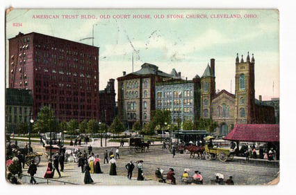 Postcard showing the American Trust Bldg., Old Court House, & Old Stone Church in Cleveland, Ohio.