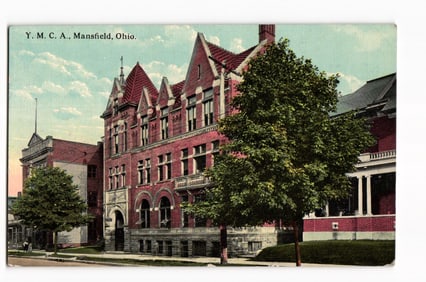 Color postcard of the impressive brick Y. M. C. A. building on a tree-lined street in Mansfield,