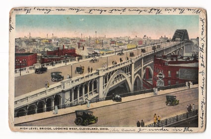 Postcard showing the High Level Bridge looking West over Cleveland, Ohio with early 1920s traffic.