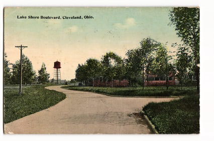 Postcard of Lake Shore Boulevard in Cleveland, Ohio, showing a water tower and road, circa 1915.