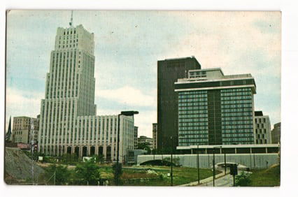Chrome postcard of the Akron, Ohio skyline from Market and Main Streets, 'Rubber Capital' c. 1960s.