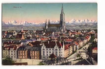 Postcard showing a panoramic cityscape of Ulm, Germany with the grand Ulm Minster and the Alps.