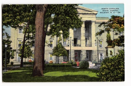 Linen postcard showing the North Carolina State Capitol, a Grecian Doric building in Raleigh, NC c.