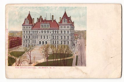 Postcard showing The State Capitol building with street view and park in Albany, New York c. 1907