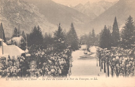Postcard featuring a snowy winter scene of the Casino Park and the Port de Venasque in Luchon,