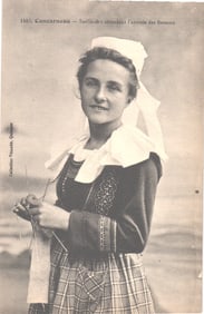 Postcard showing a Sardinière in traditional Breton attire awaiting the boats, Concarneau, France.
