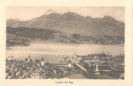 Postcard showing an elevated cityscape of Lucerne, Switzerland with Mount Rigi, circa 1910s.