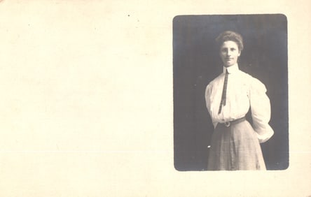 RPPC Real Photo Postcard studio portrait of a woman in Edwardian fashion, Amsterdam, NY c. 1910s.