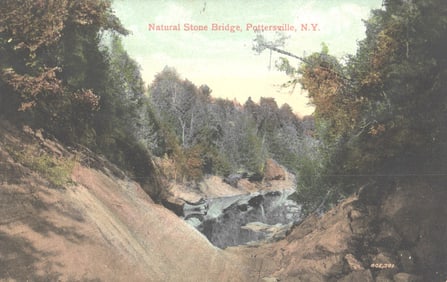 Scenic postcard of the Natural Stone Bridge, a popular tourist attraction in Pottersville, NY c.