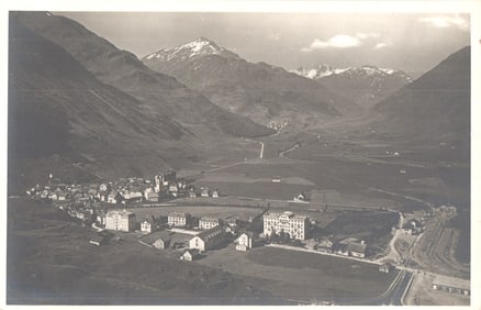 Postcard of the Swiss mountain village of Andermatt, looking towards the Furka Pass, c. 1920s.