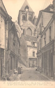 Postcard showing the Rue du Four in Saint-Aignan, France, with 15th-16th century homes and church.