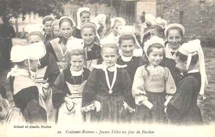 Postcard of young girls in traditional Breton costumes on a Pardon Day festival in Brittany, France.