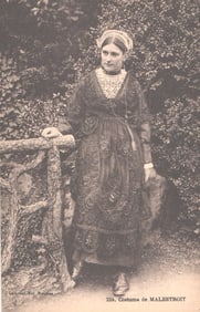 Postcard of a woman in the traditional costume of Malestroit, Brittany, France. Laurent-Nel card.