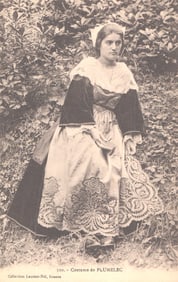Postcard depicting a woman wearing the traditional folk costume of Pluméléc, Brittany, France