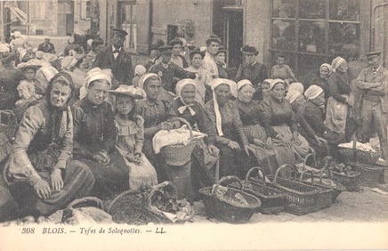 Postcard of Solognote women in traditional dress with baskets at a market in Blois, France c. 1920s