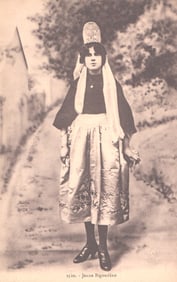 Postcard portrait of a Jeune Bigoudène in traditional dress and tall lace coiffe, Brittany, France.