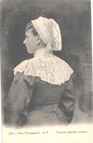 Postcard portrait of a woman in profile wearing a traditional lace coiffe & collar, Touraine, France