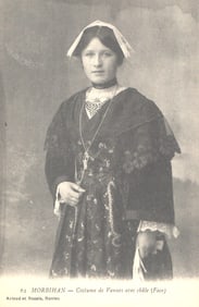Postcard showing a woman in traditional costume of Vannes, Morbihan, Brittany, France. c. 1905.