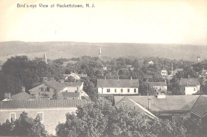 Postcard with a scenic bird's-eye view of Hackettstown, New Jersey, looking over the rooftops.