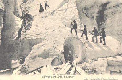 Postcard showing explorers and tourists at the Ice Grotto (Eisgrotte) in the Eiger Glacier, 1911.