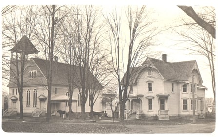 RPPC showing a church and large residence with horses and carriage, Sherburne, New York. c. 1910s