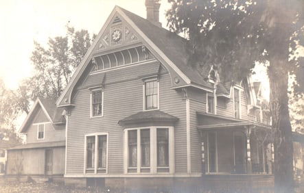 RPPC Real Photo Postcard of an ornate Victorian home with decorative gable and bay window, c. 1900s