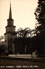 RPPC Real Photo Postcard of the M.E. Church on a quiet street in Grass Valley, California c. 1910.