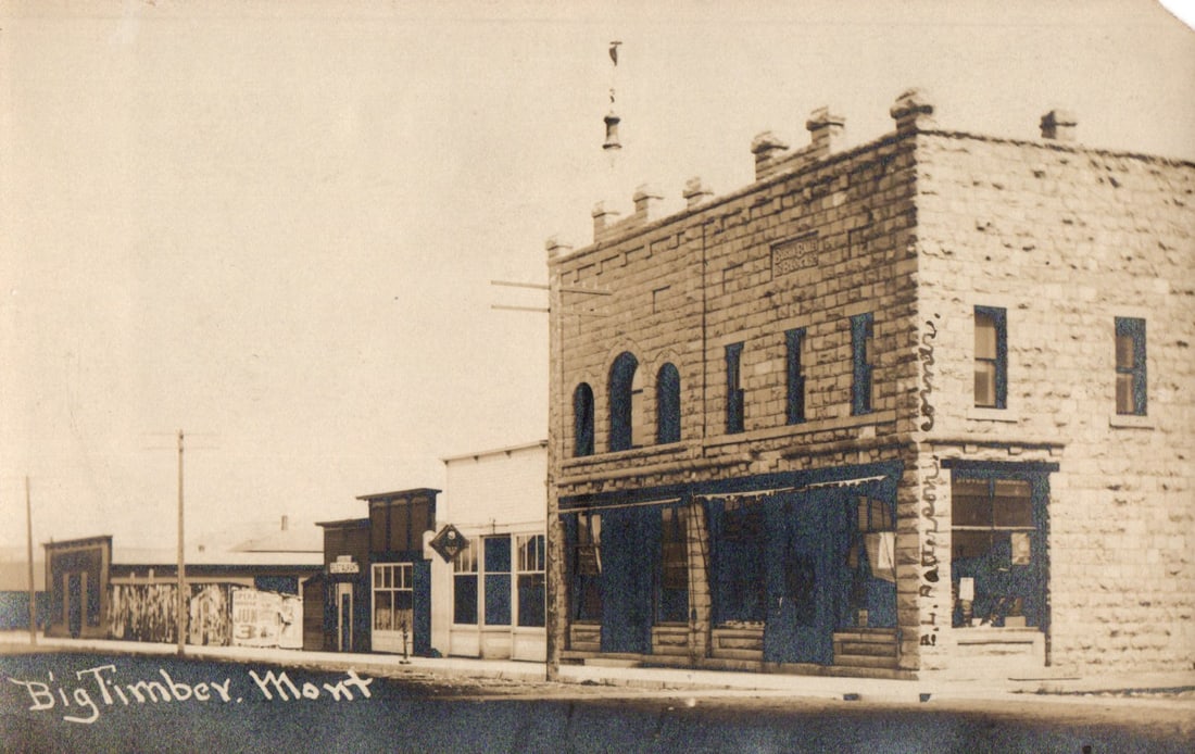 RPPC Real Photo Postcard street scene in Big Timber, Montana showing the E.L.A. Hoopesman building (1 of 2)