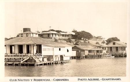 RPPC Photo Postcard of Club Náutico y Residencias on the waterfront in Caimanera, Guantánamo, Cuba