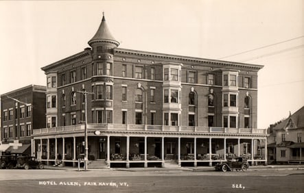 RPPC Real Photo Postcard showing the Hotel Allen in Fair Haven, VT with early automobiles, c. 1910s