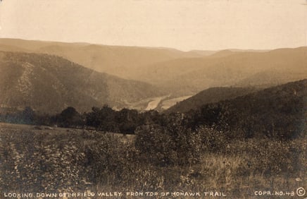 Postcard showing the panoramic scenic view looking down the Deerfield Valley from the Mohawk Trail,
