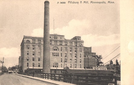 Postcard showing the historic Pillsbury A Mill and its prominent smokestack in Minneapolis,