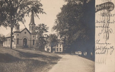 RPPC Real Photo Postcard showing a church on a hill and street view in Harrison, Maine. c. 1905.
