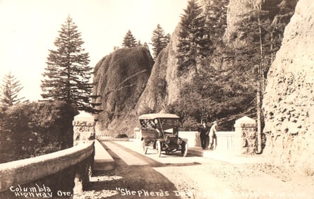 RPPC of an early automobile crossing the Shepherds Dell bridge on the Columbia Highway in Oregon.