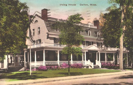 Hand-colored postcard of the historic Irving House hotel with its grand porch in Dalton, Mass., c.