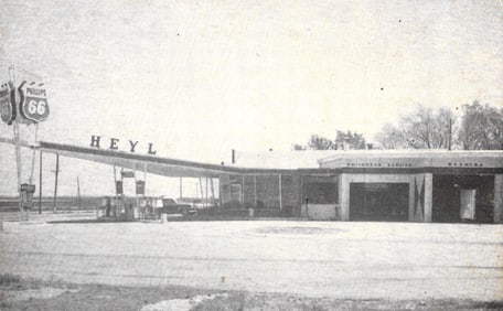 Postcard view of Heyl's Phillips 66 gas station and Philcheck Service in Sharon Springs, Kansas