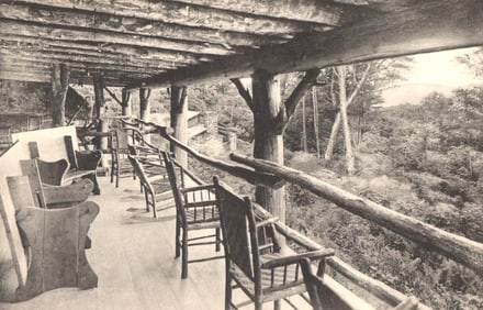 Postcard showing the rustic log veranda of the Long Trail Lodge, Green Mountain Club, Rutland, VT